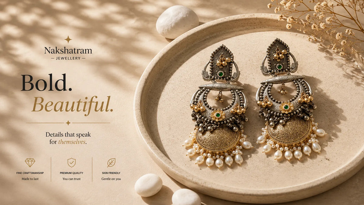 Nakshatram jewellery earrings on a beige plate with decorative elements.